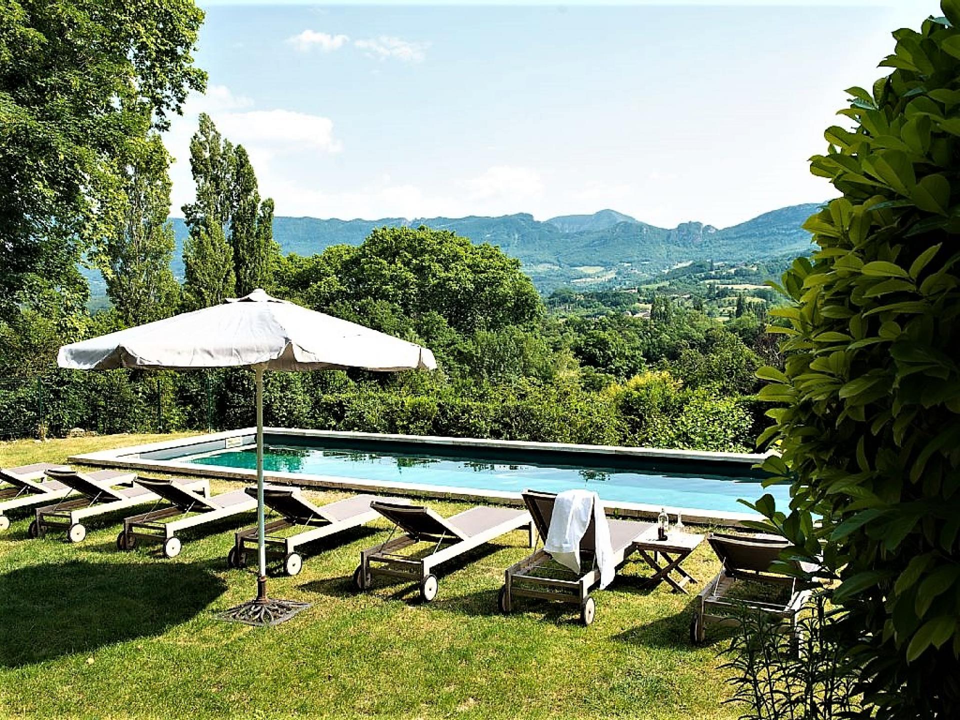VIEWS ON THE MOUNTAINS FROM THE DOMAINE DE LA DROME SWIMMING POOL