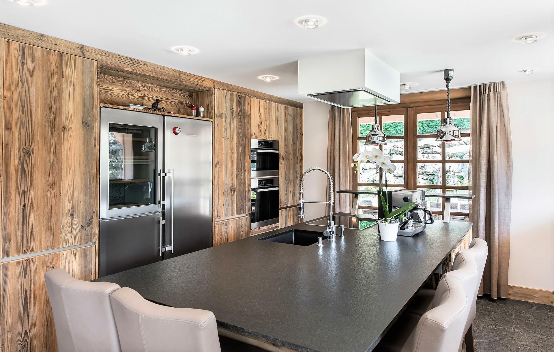 A BEAUTIFUL KITCHEN IN A SKI HOLIDAY CHALET IN MEGEVE