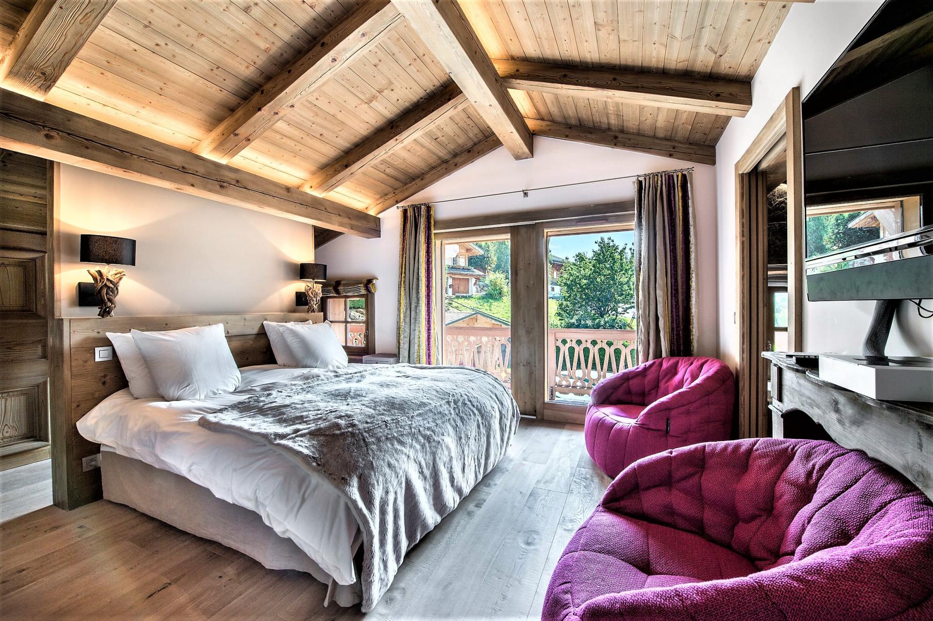 THE MASTER BEDROOM IN A CHALET RENTAL IN THE FRENCH ALPS