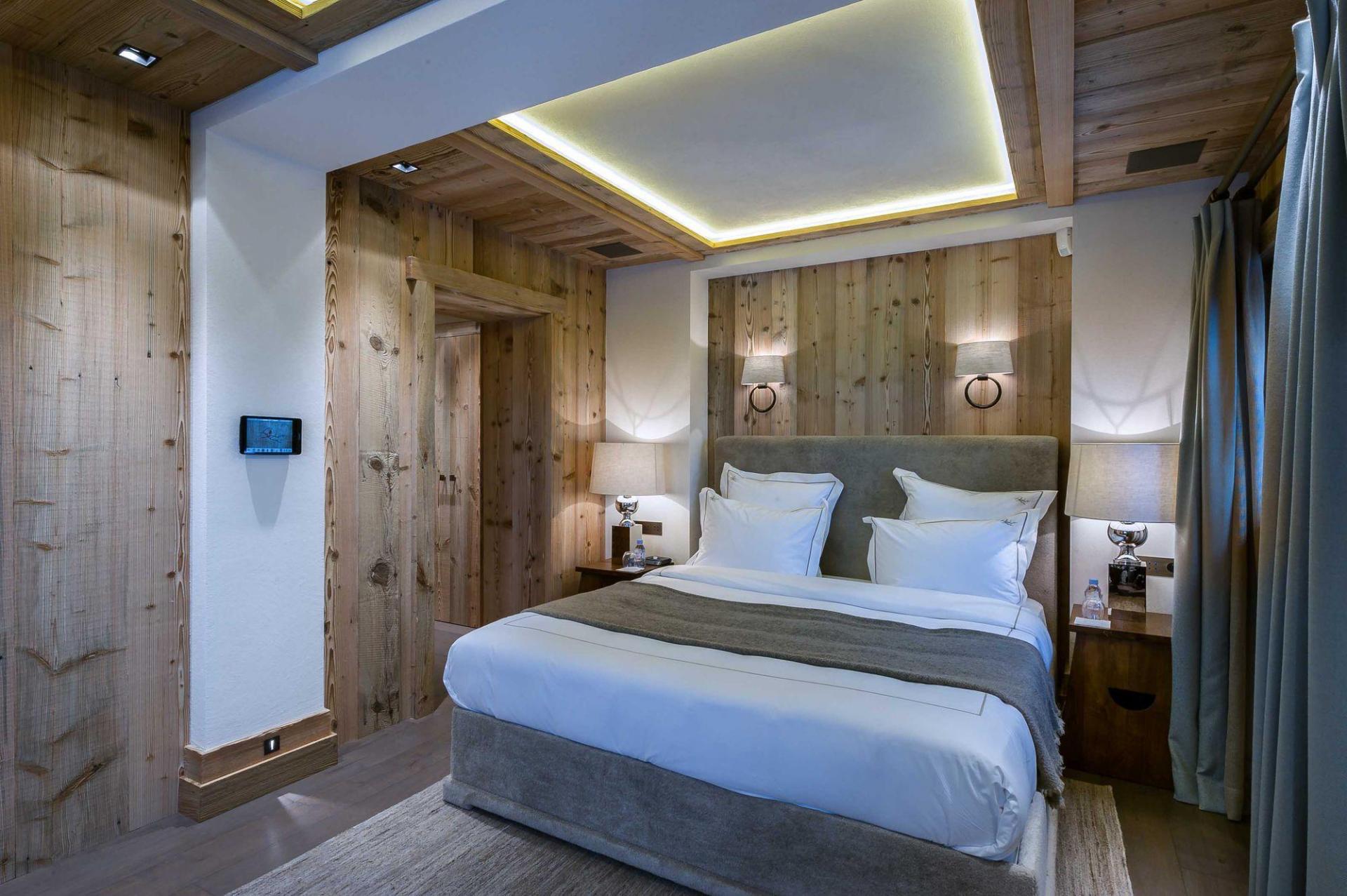 ONE OF THE BEDROOMS IN A CHALET RENTAL IN COURCHEVEL